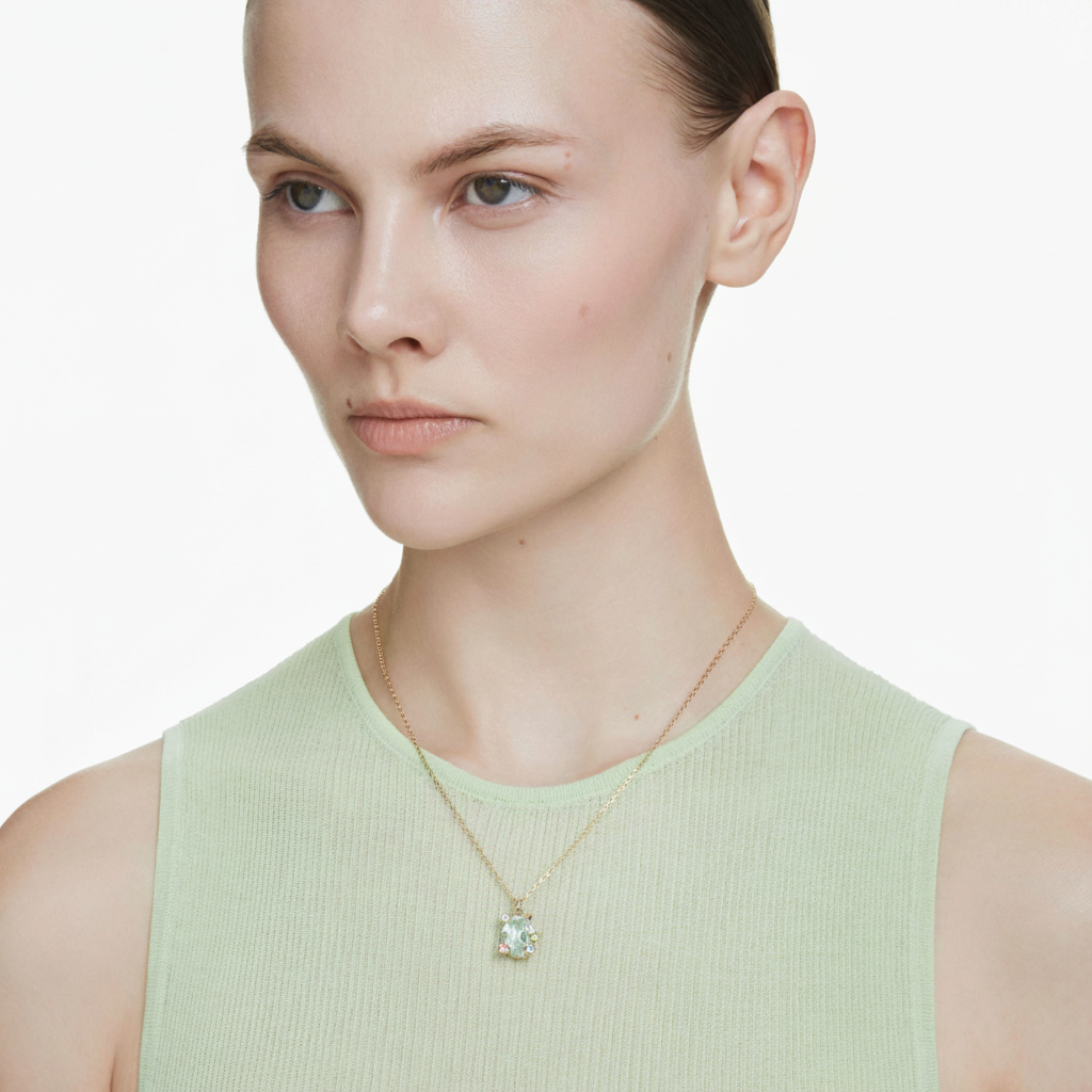 Swarovski Gema pendant with multicolored mixed cuts and gold-tone plating, showcasing sparkling crystal details.