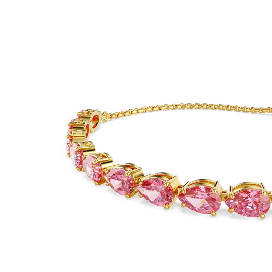 Swarovski Matrix bracelet with pink pear-cut crystals and gold-tone plated links, elegant jewelry accessory.