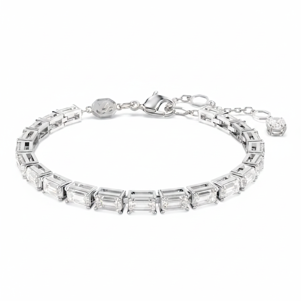 Swarovski Matrix tennis bracelet with baguette-cut white crystals and rhodium plating, showcasing a sleek, elegant jewelry design.