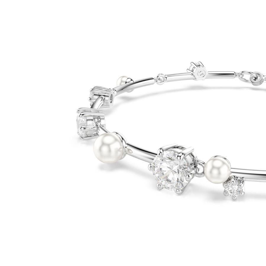 Swarovski Constella tennis bracelet featuring sparkling crystal stones and a delicate silver chain design.