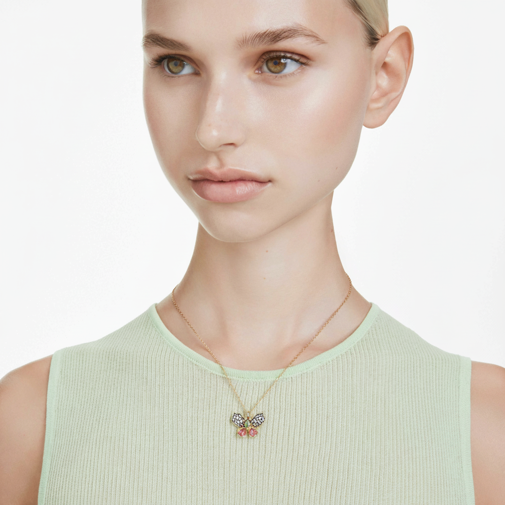 Swarovski Idyllia pendant with multicolored butterfly design, mixed cuts, pavé setting, and mixed metal finish.