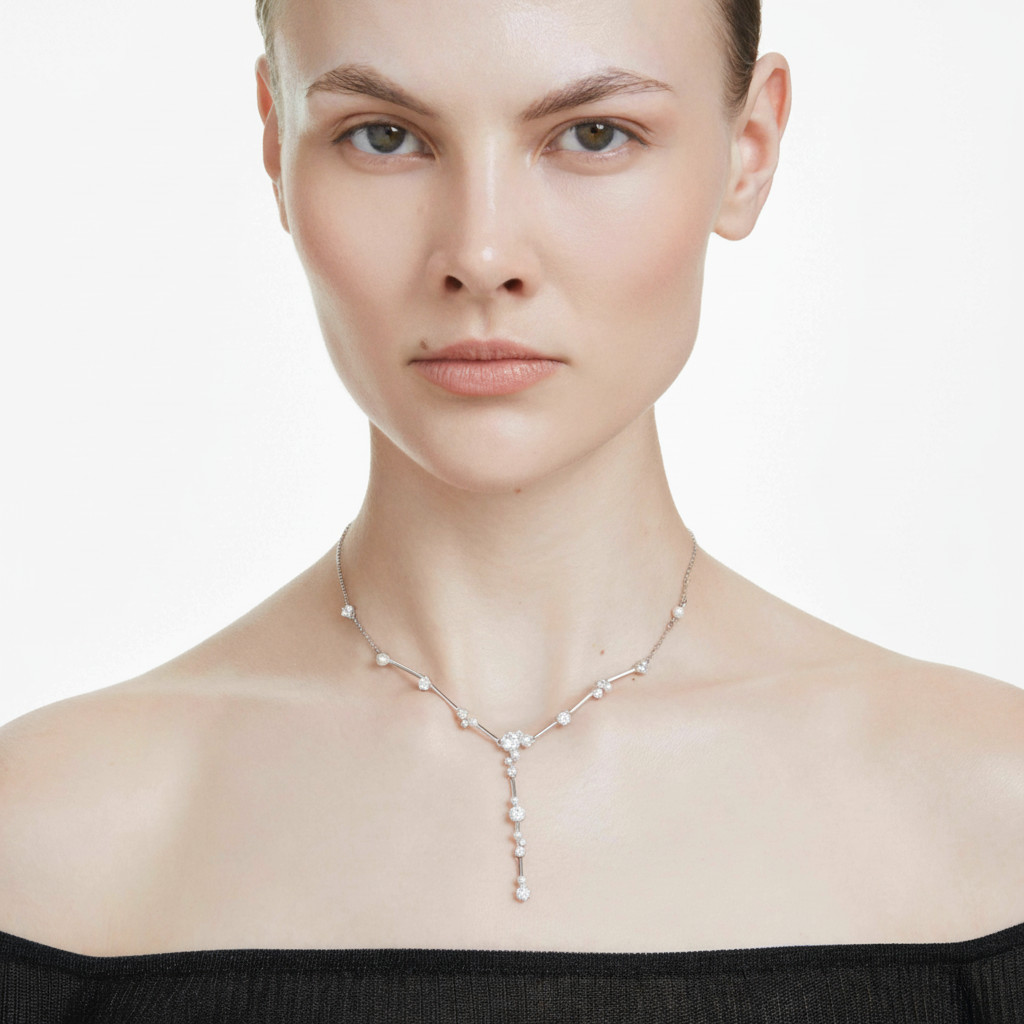 Swarovski Constella Y Necklace with crystal pearl and round cuts in white, rhodium-plated, showcasing elegant jewelry design.