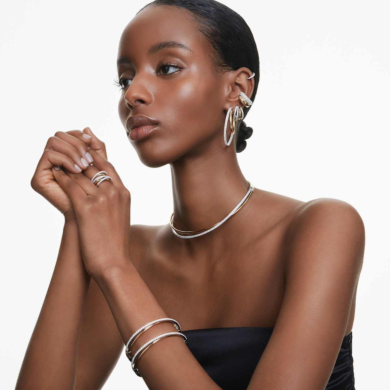 Swarovski Hyperbola ring with mixed cuts in white and mixed metal finish, showcasing elegant geometric design and sparkling crystals.