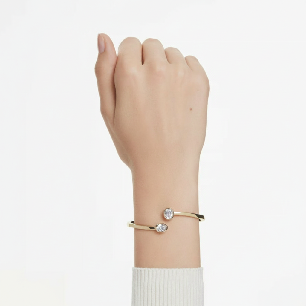 Swarovski Imber Bangle featuring sparkling crystal accents on a sleek silver-tone bracelet design.