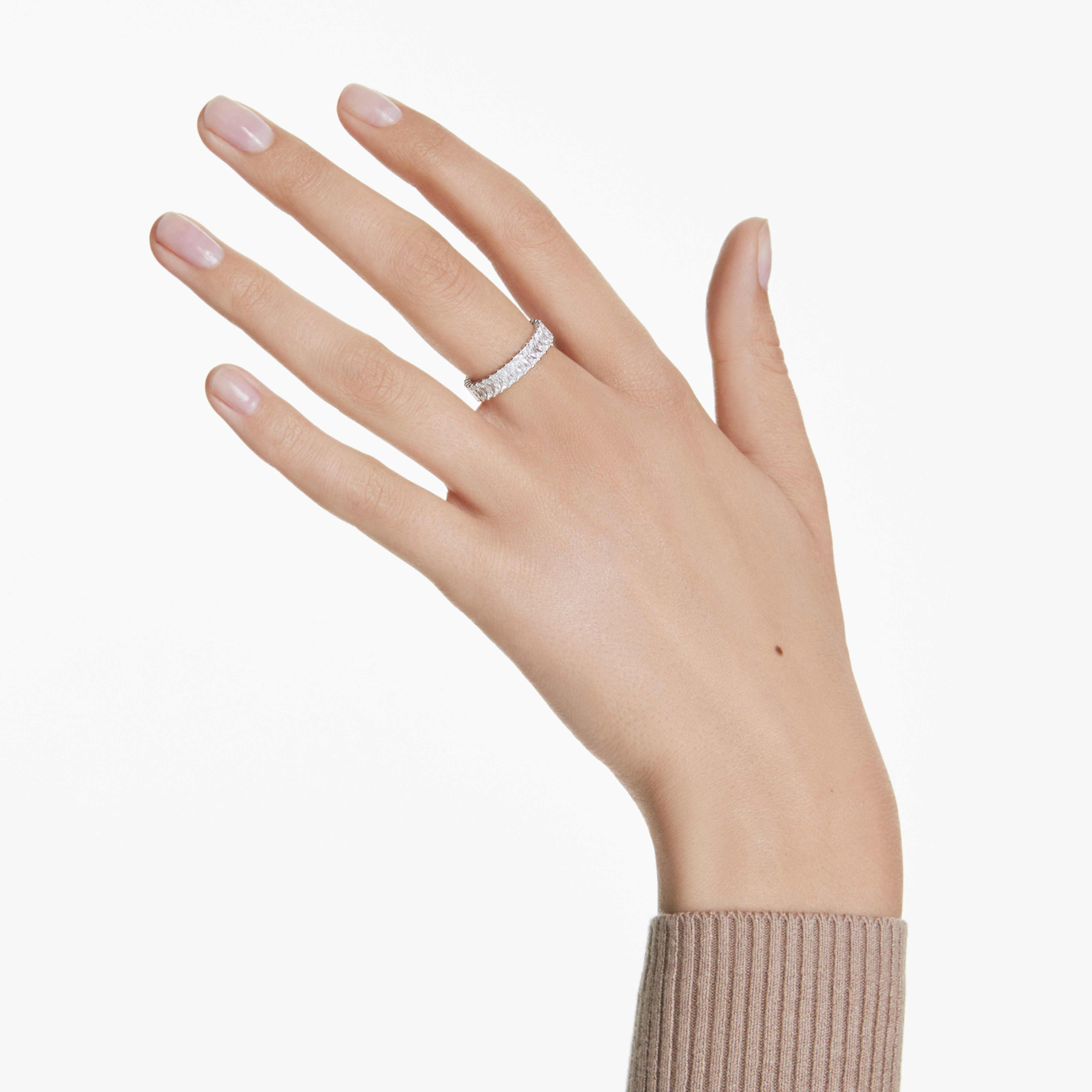 Swarovski Matrix ring with baguette-cut white crystals in silver-tone finish, showcasing a sleek, modern jewelry design.