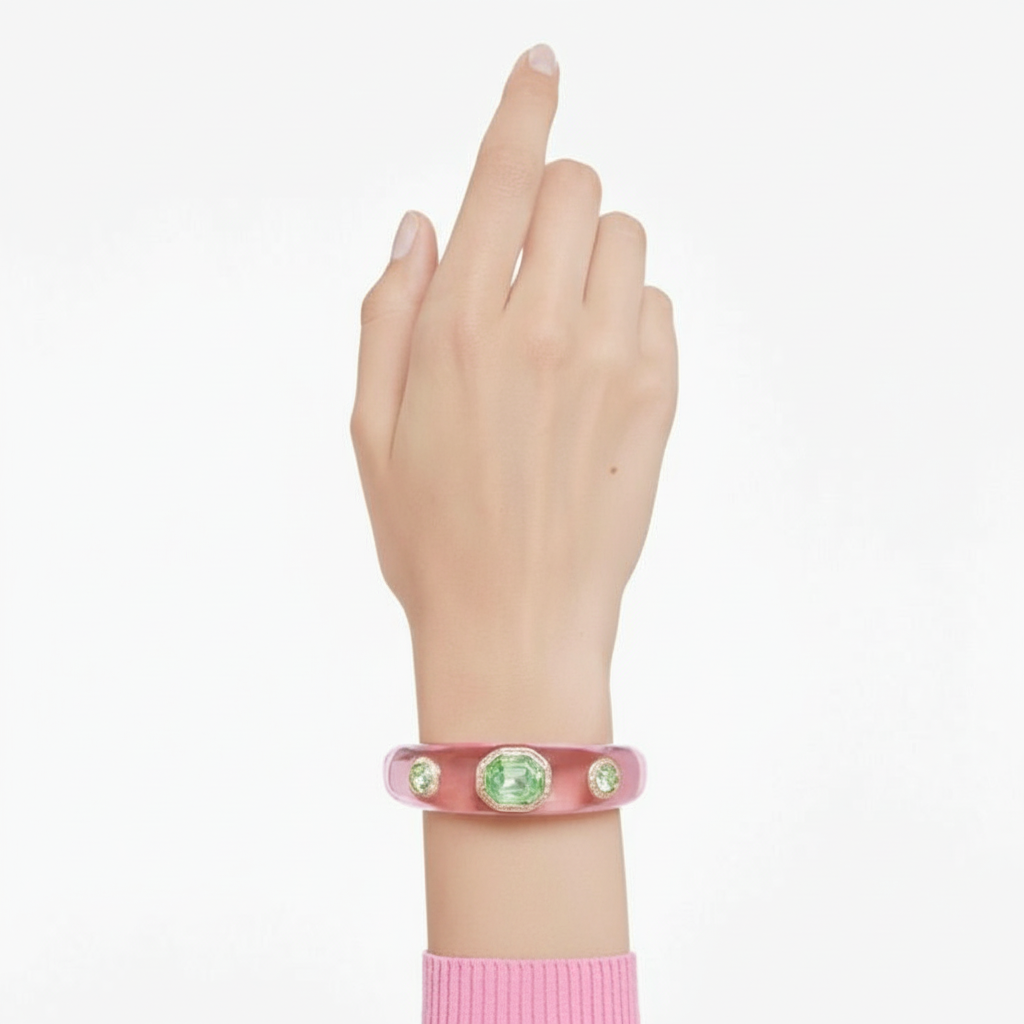 Swarovski Dulcis cuff bracelet with mixed cut multicolored crystals and gold-tone plating, stylish and elegant jewelry accessory.
