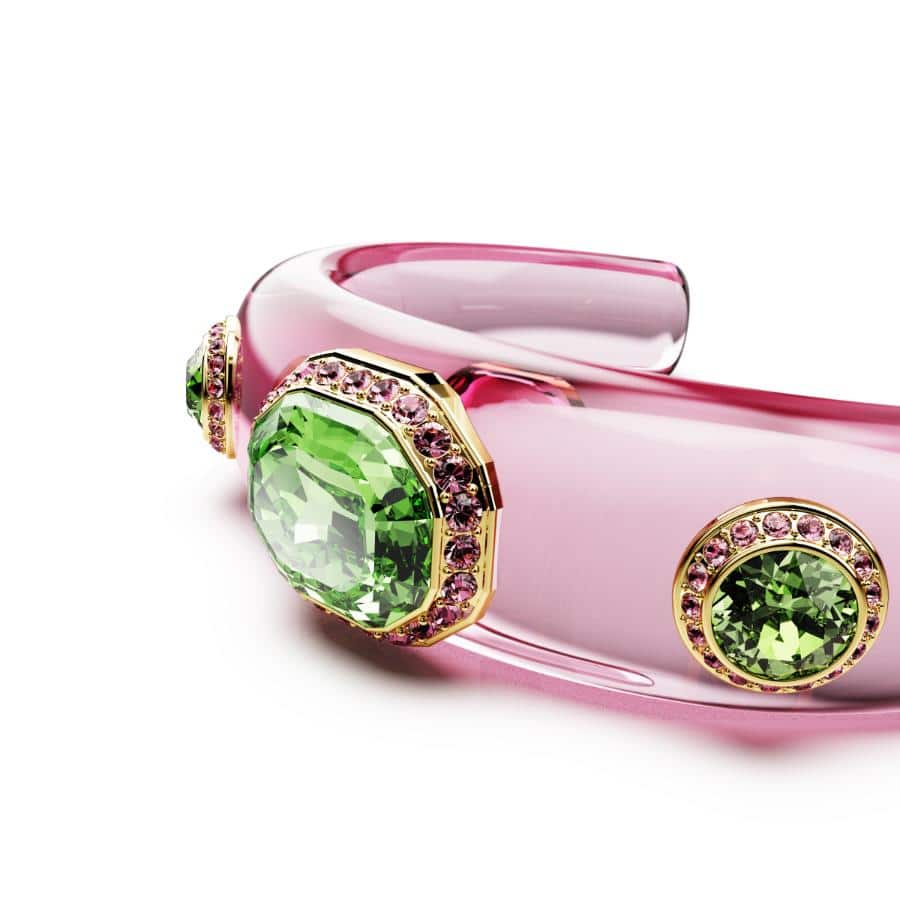 Swarovski Dulcis cuff bracelet with multicolored mixed cuts and gold-tone plating, featuring intricate gemstone details.