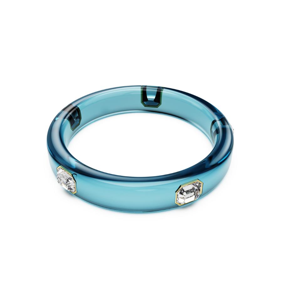 Swarovski Dulcis bangle with clear crystal accents and silver-tone metal, showcasing elegant jewelry design.