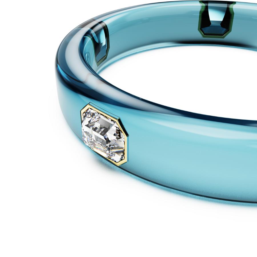 Swarovski Dulcis Bangle featuring sparkling crystal accents and a sleek silver-tone design on a plain background.