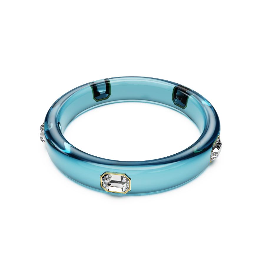 Elegant Swarovski Dulcis bangle featuring sparkling crystal accents and a sleek silver-tone design.