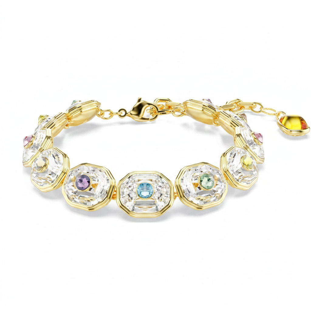 Swarovski Chroma tennis bracelet with sparkling multicolored crystals and silver-tone chain on a white background.