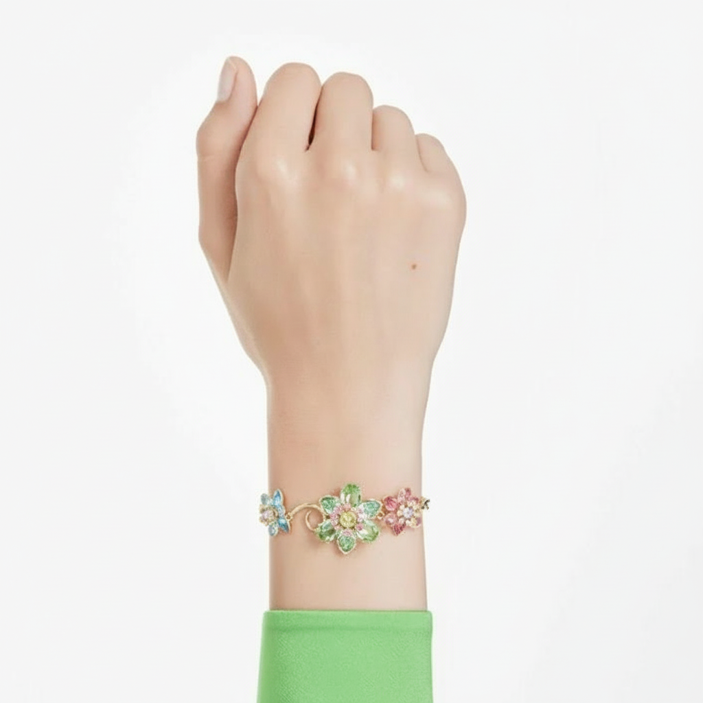 Swarovski Idyllia bracelet with multicolored flower design, mixed cuts crystals, and gold-tone plating.