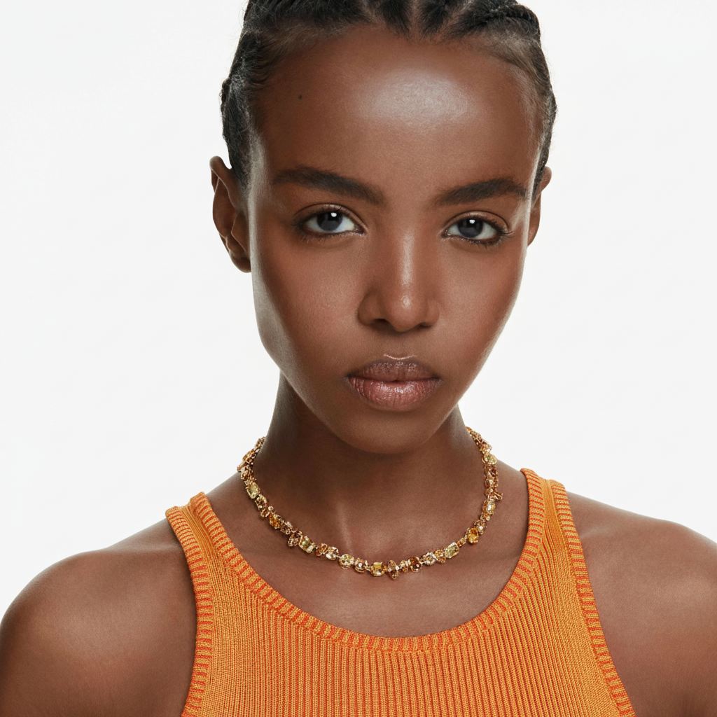Swarovski Gema Tennis Necklace with mixed cut yellow Swarovski crystals, gold-tone plated, elegant jewelry piece.