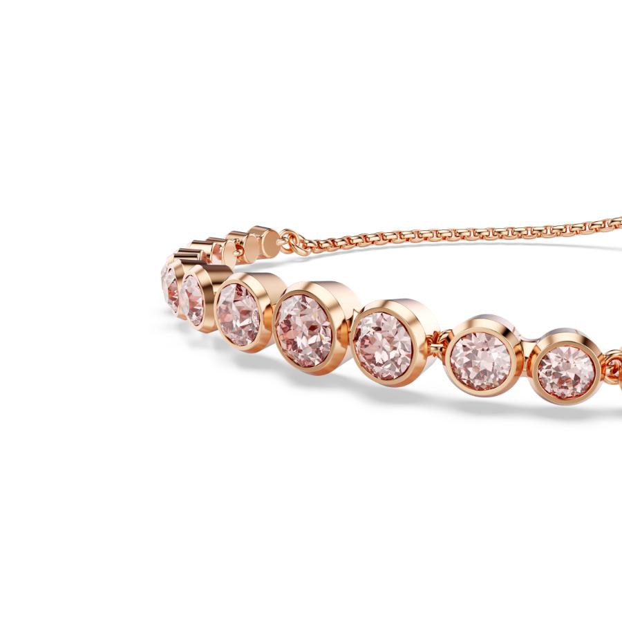 Swarovski Imber tennis bracelet with sparkling crystal stones and silver-tone chain, elegant jewelry accessory.