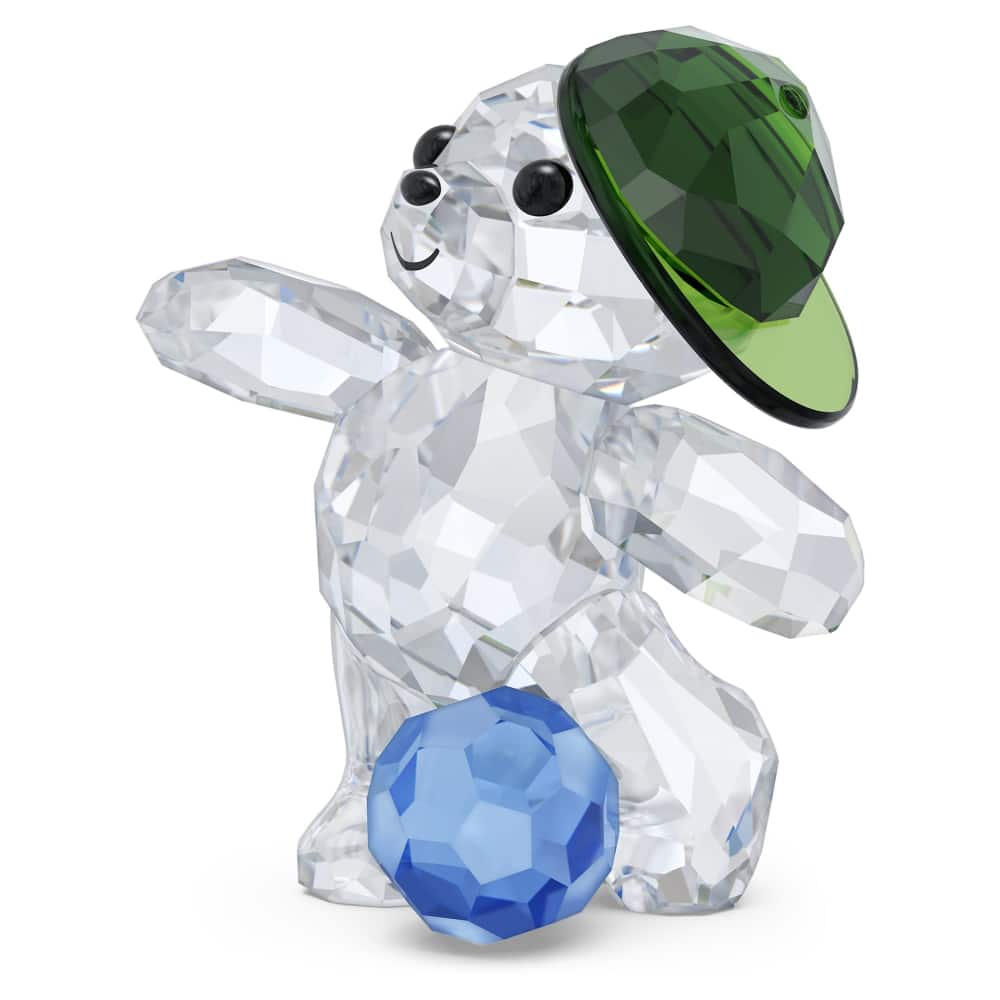 Swarovski Kris Bear Goal Scorer Bear figurine with detailed crystal craftsmanship, featuring a playful bear holding a soccer ball.