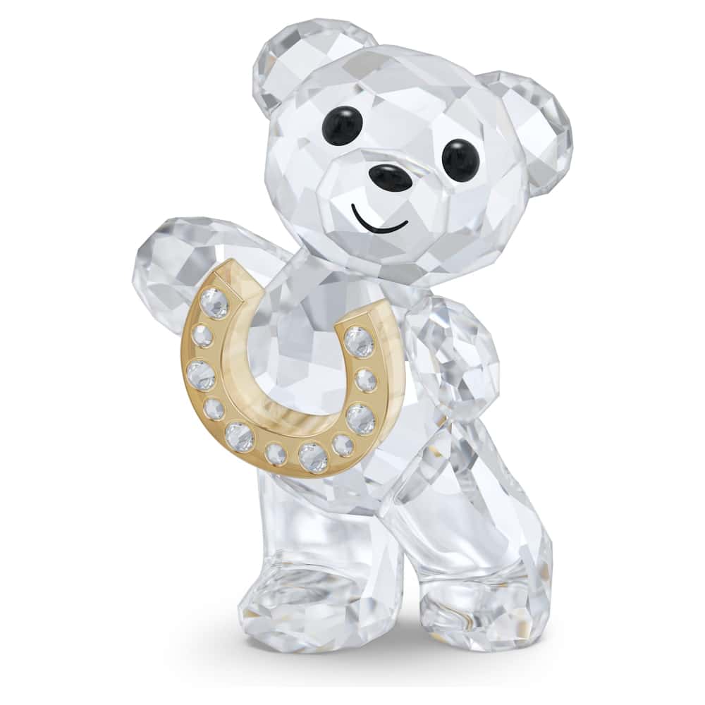 Swarovski Kris Bear figurine holding a lucky horseshoe, crystal-clear Swarovski crystal glass collectible ornament.