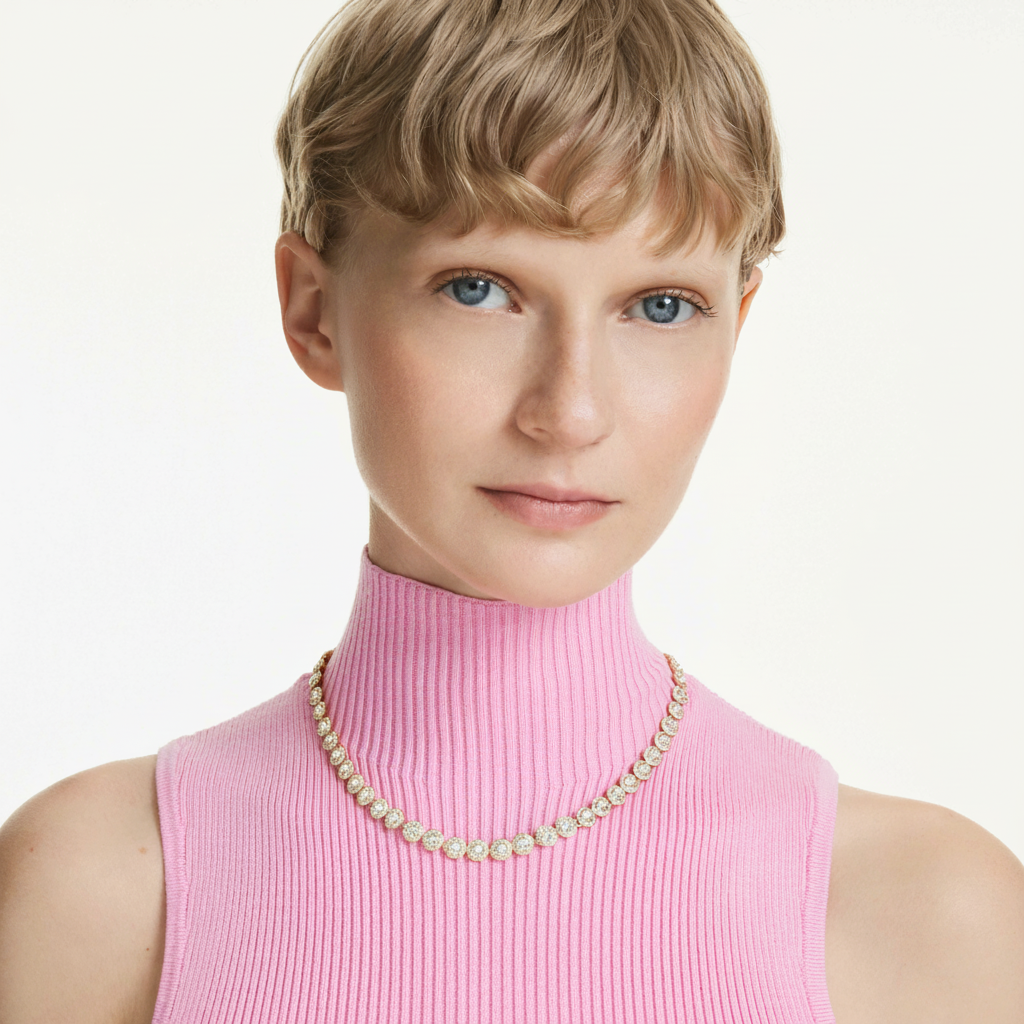 Swarovski Una Angelic Tennis Necklace with round-cut white crystals on gold-tone plated chain, elegant jewelry accessory