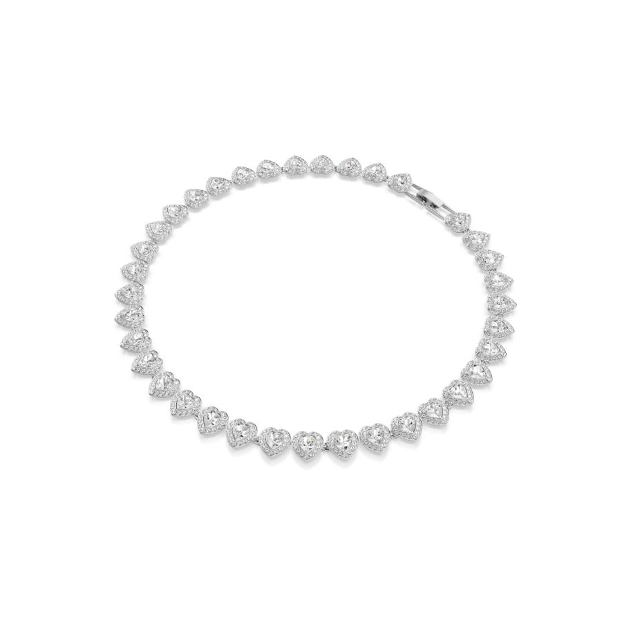 Swarovski Ariana Grande tennis necklace with mixed heart-shaped white crystals, rhodium-plated chain, and sparkling design.