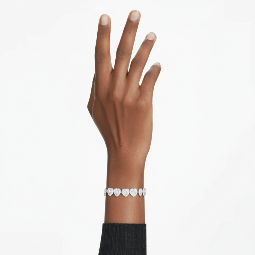 Swarovski Ariana Grande x Swarovski tennis bracelet with sparkling crystals and silver-tone chain on a white background.