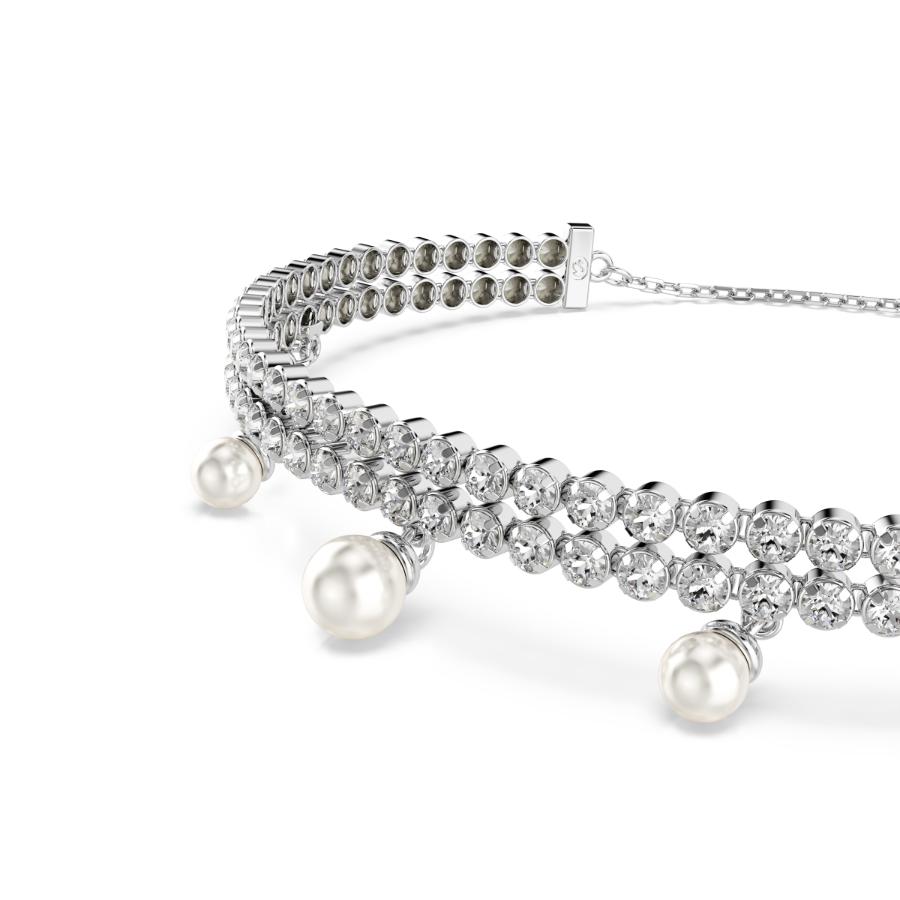 Swarovski Ariana Grande x bracelet featuring sparkling crystals and delicate chain design, close-up view of the jewelry.