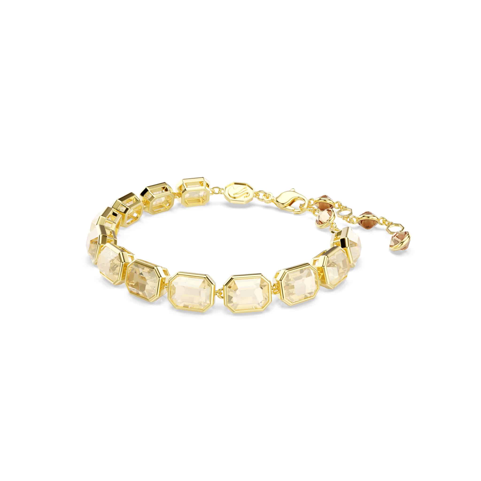 Swarovski Millenia tennis bracelet with octagon cut caramel crystals in gold-tone plating, elegant jewelry accessory.