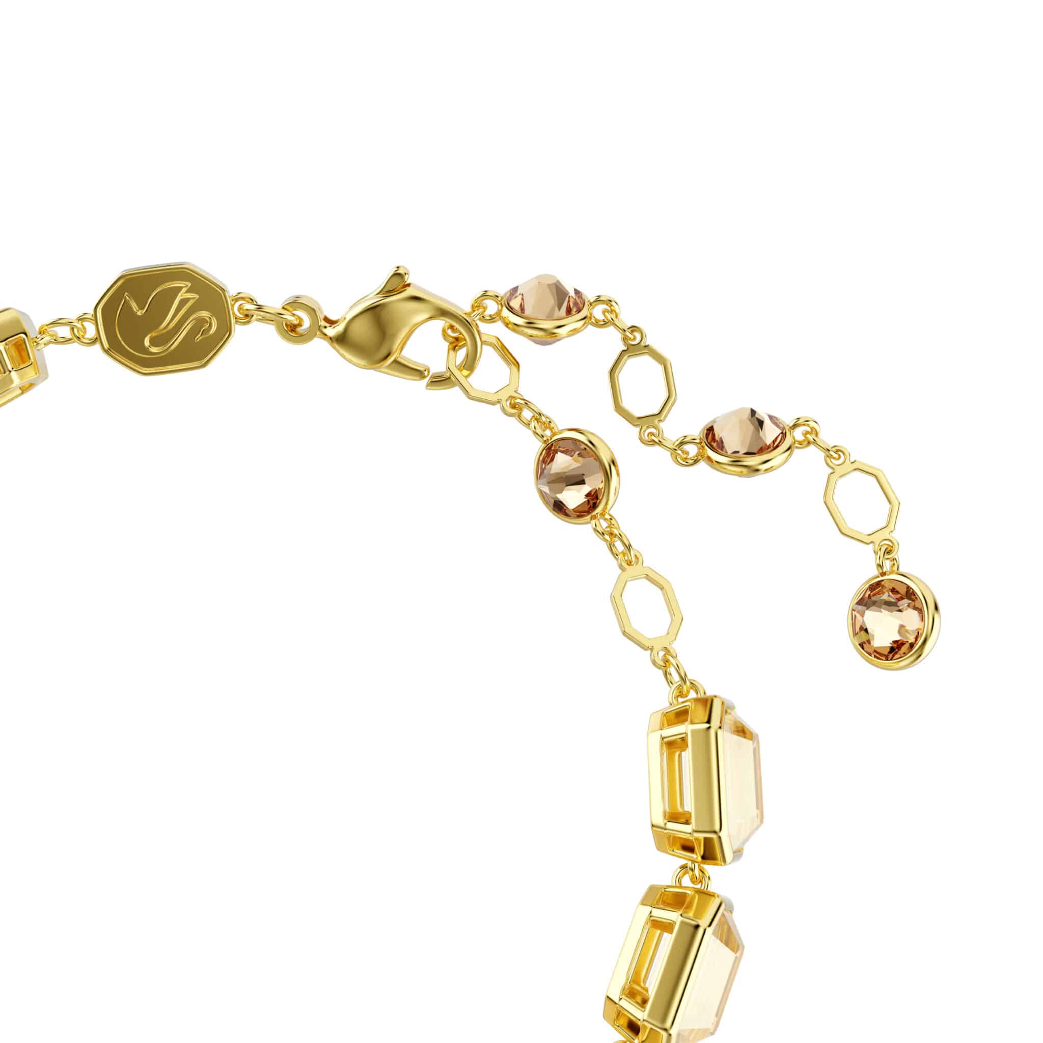 Swarovski Millenia tennis bracelet with octagon cut caramel crystals in gold-tone plating, elegant jewelry accessory.