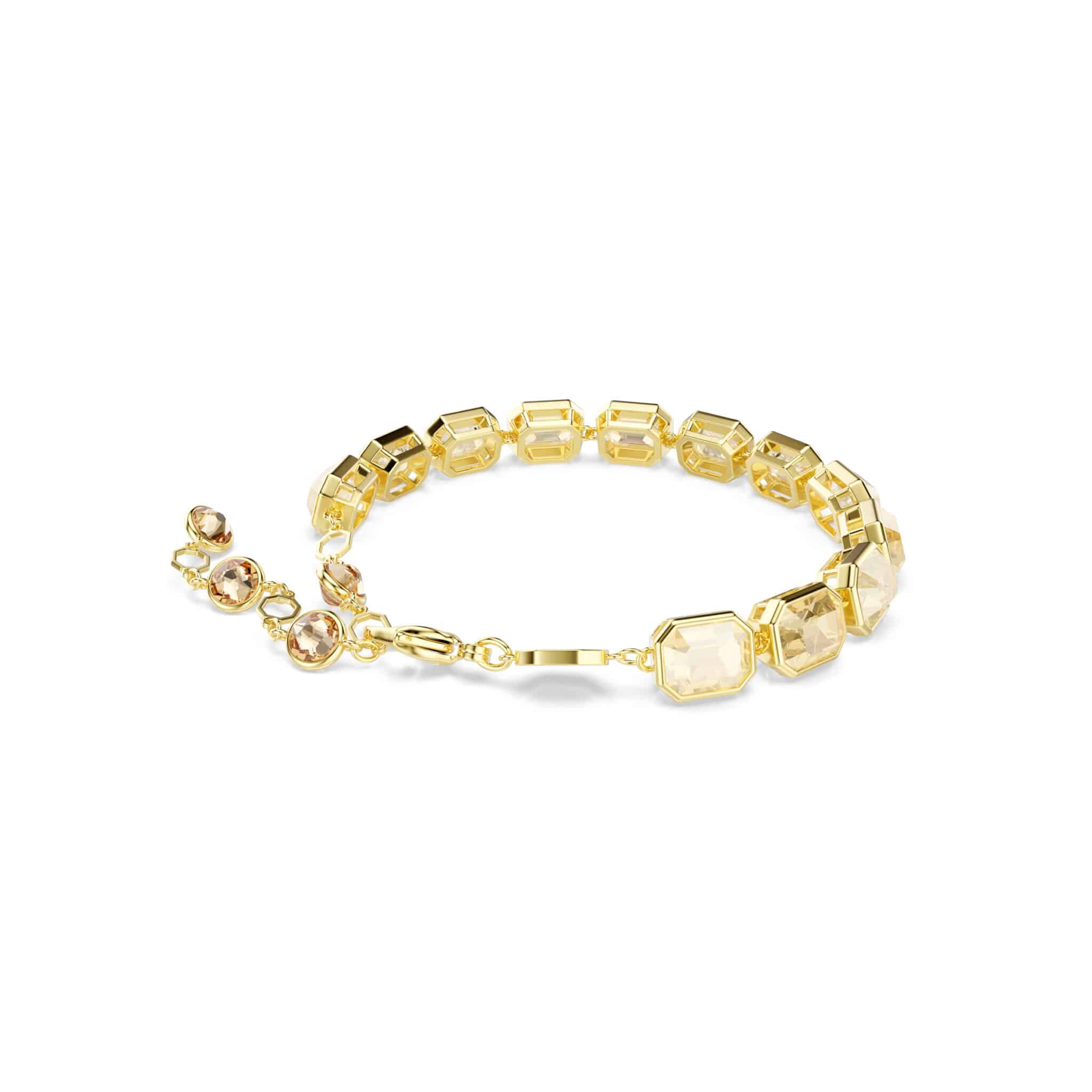 Swarovski Millenia Tennis Bracelet with octagon-cut caramel crystals and gold-tone plating, elegant jewelry accessory.