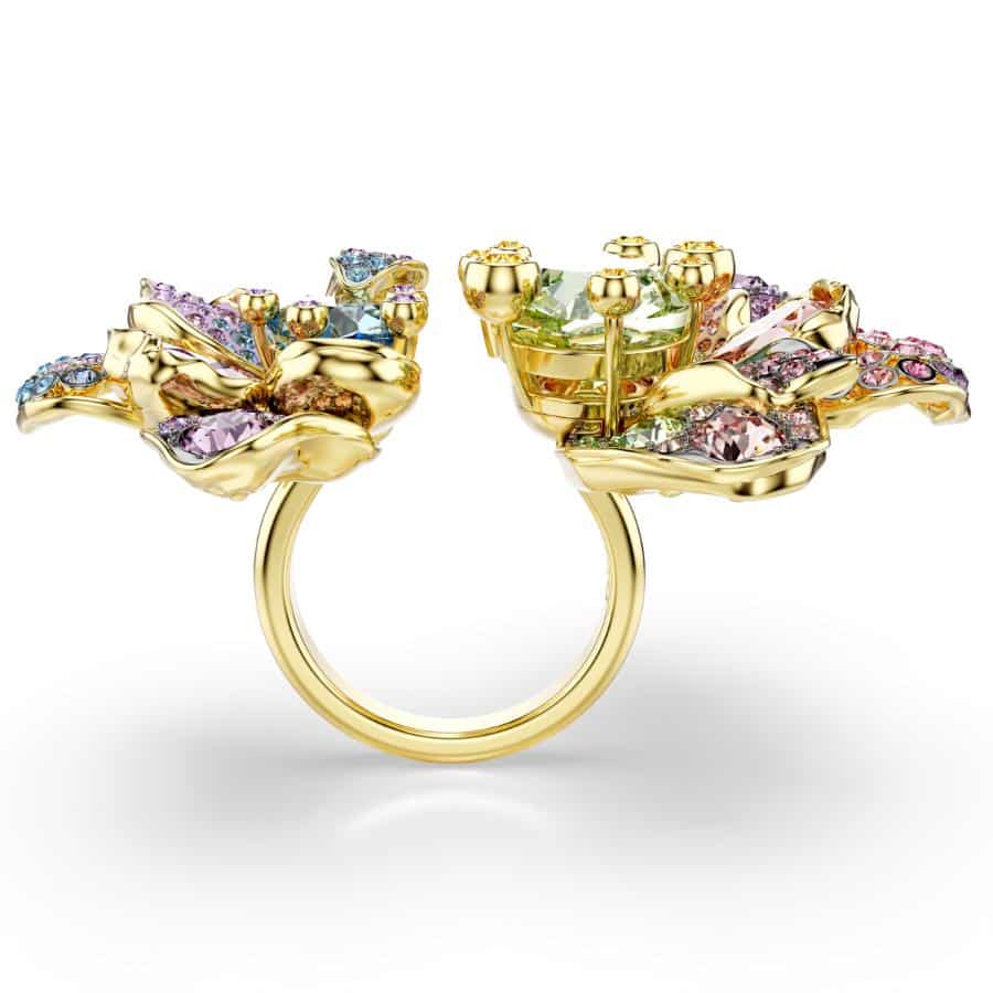 Swarovski Idyllia ring with mixed cuts, pavé flower design, multicolored stones, and mixed metal finish on a white background.