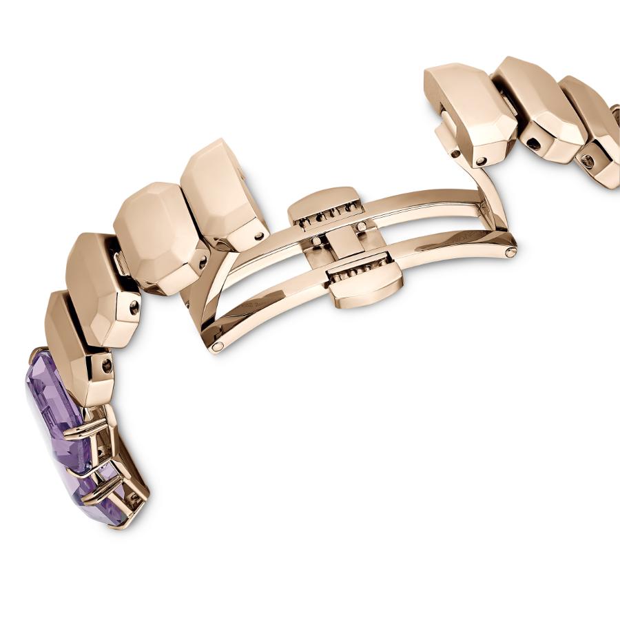 Swarovski purple octagon cut bracelet watch with champagne gold-tone finish, featuring a sleek and elegant design.