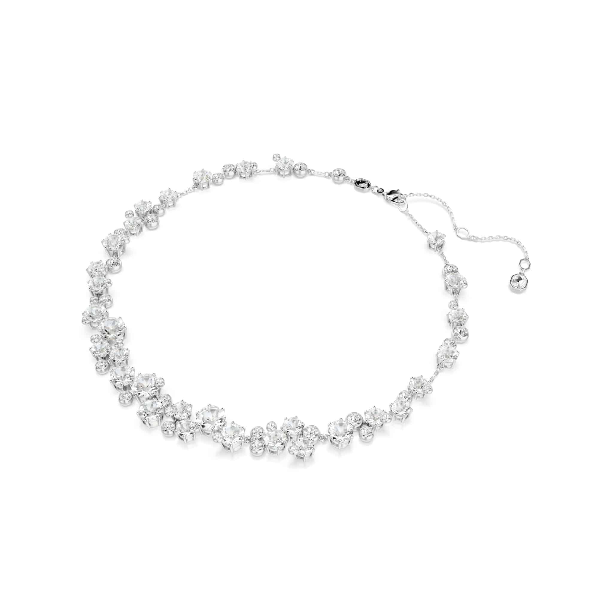 Swarovski Constella necklace with round-cut white crystals and rhodium-plated chain, elegant jewelry accessory.