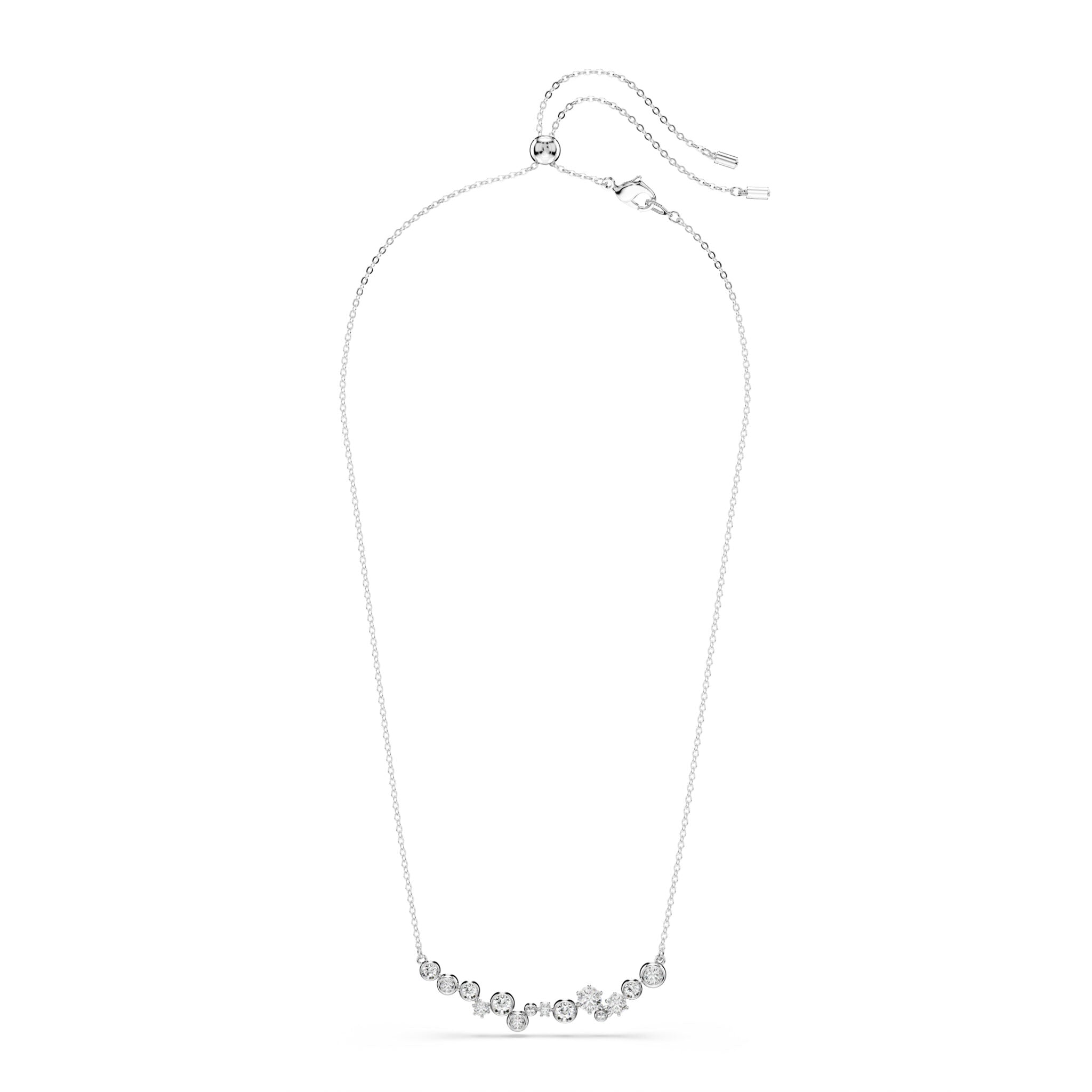 Swarovski Constella necklace with mixed-cut white crystals, rhodium-plated chain, elegant jewelry design.