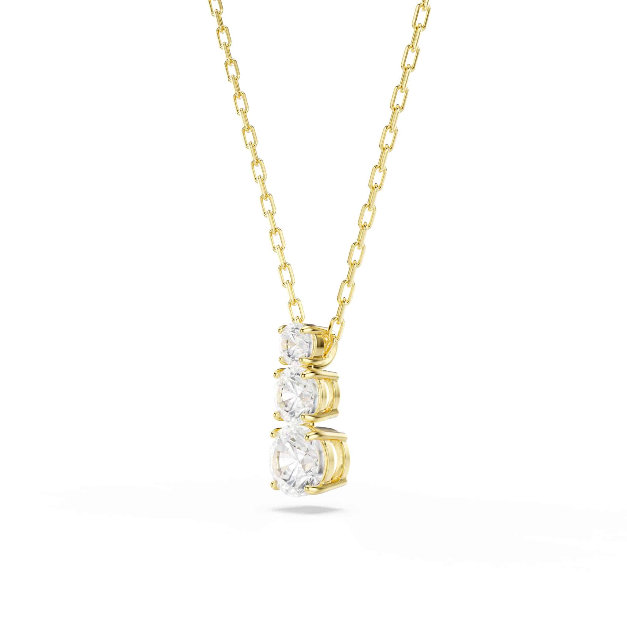 Swarovski Stilla Attract pendant with round white crystal and gold-tone plated setting, elegant jewelry jewelry.
