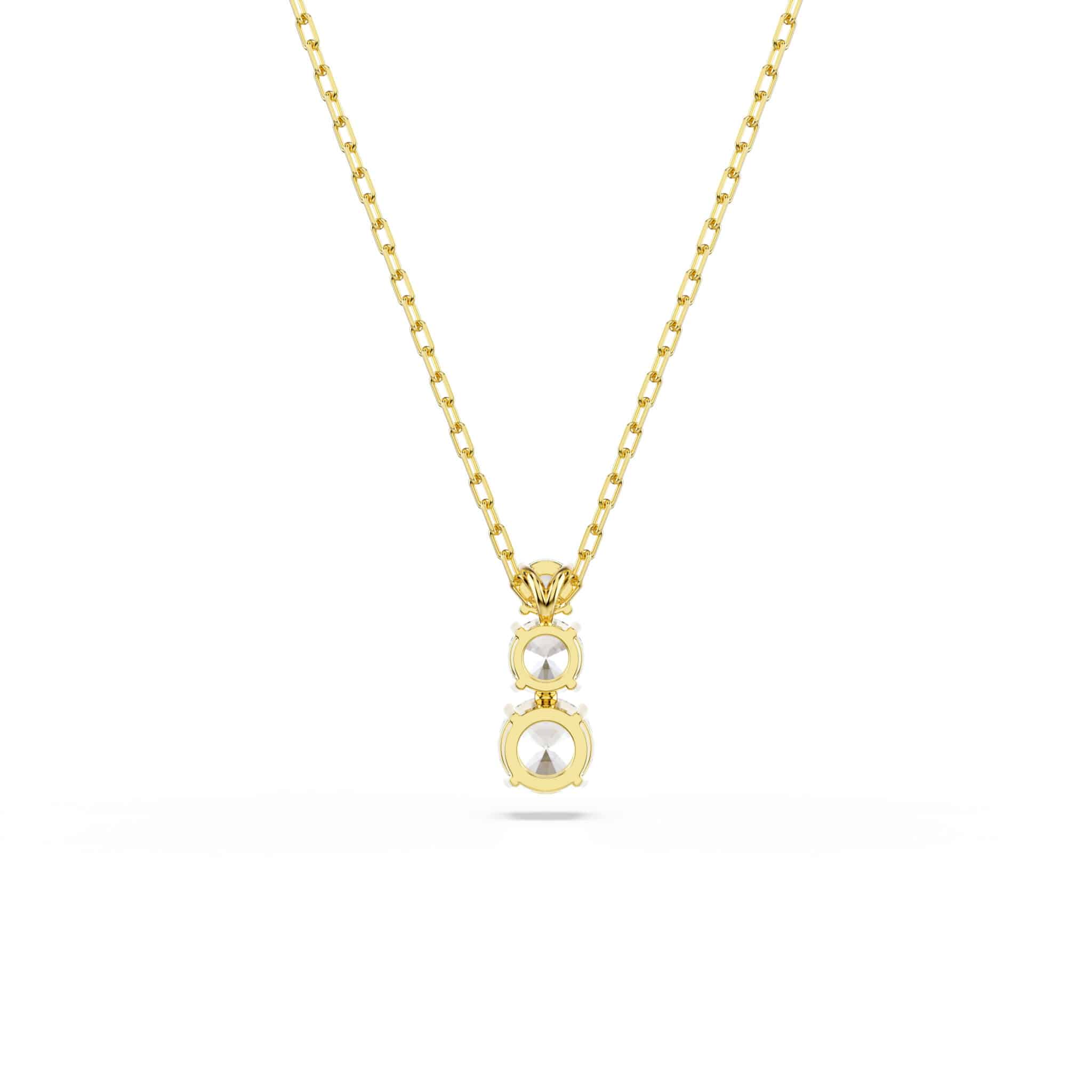 Swarovski Stilla Attract pendant with round white crystal, gold-tone plated jewelry featuring elegant design and sparkling stone.
