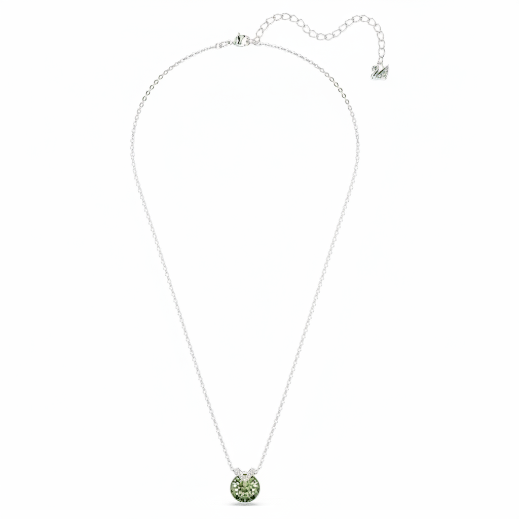 Swarovski Bella V pendant featuring a round-cut green crystal, rhodium-plated metal setting, elegant jewelry accessory.
