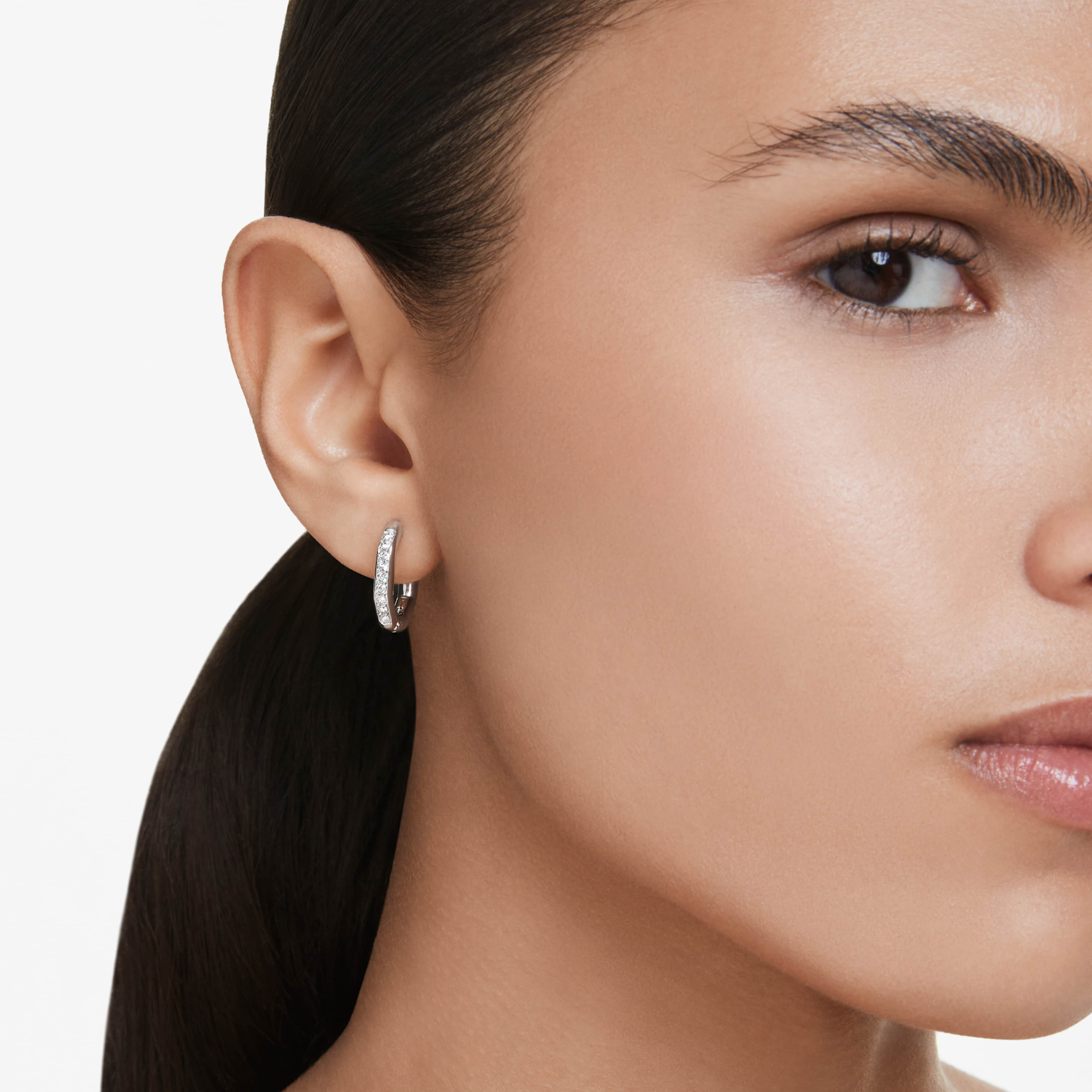 Swarovski Dextera gold-tone plated hoop earrings with octagon shape and round-cut white crystals.