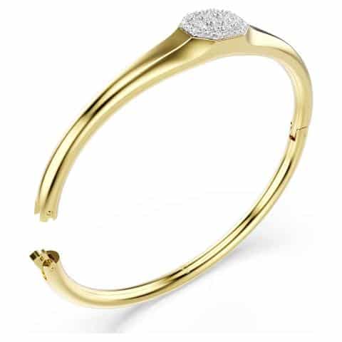 Swarovski Dextera gold-tone plated bangle with round cut white crystals, elegant jewelry accessory.