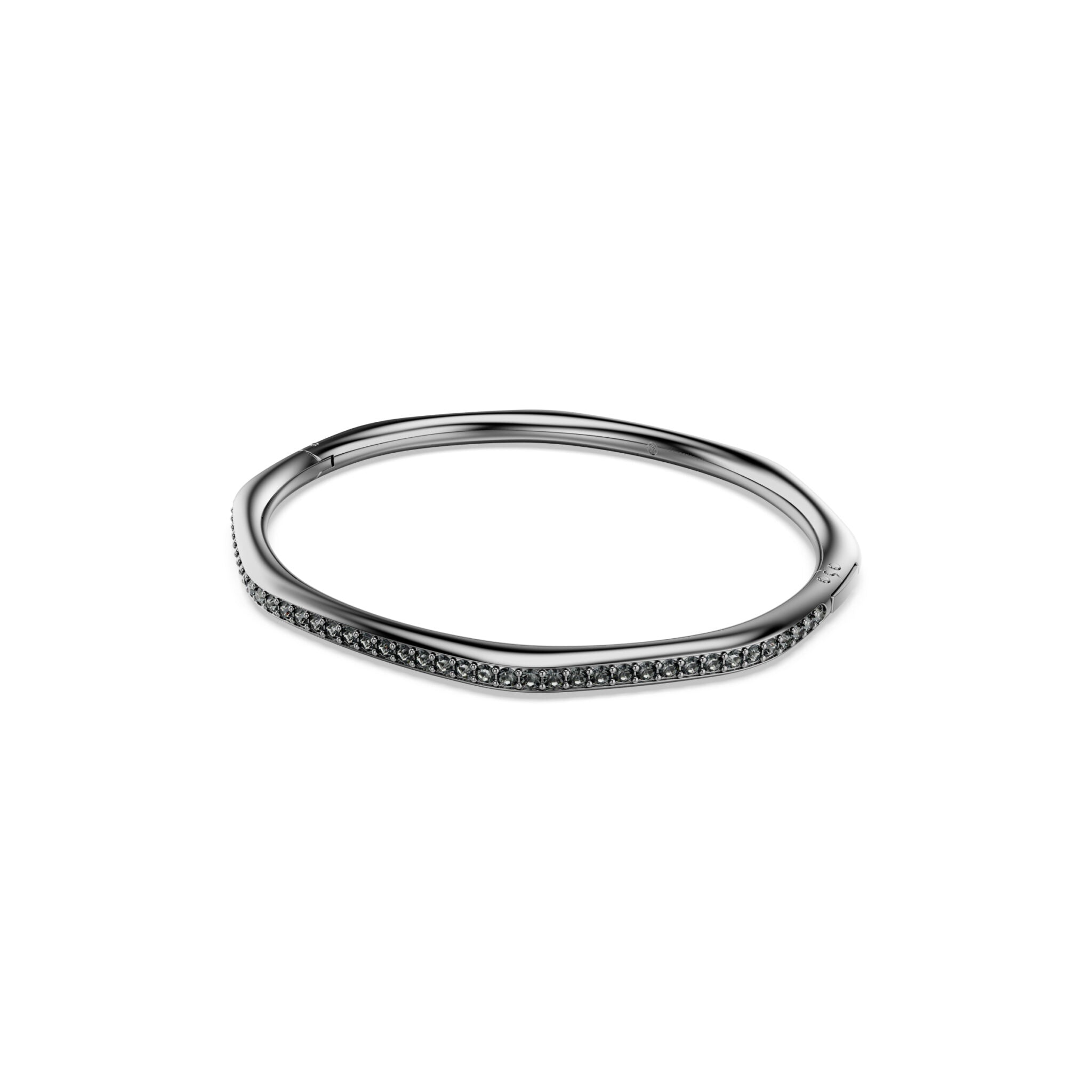 Swarovski Dextera bangle with sparkling crystal accents and sleek silver-tone design, showcased on a white background.