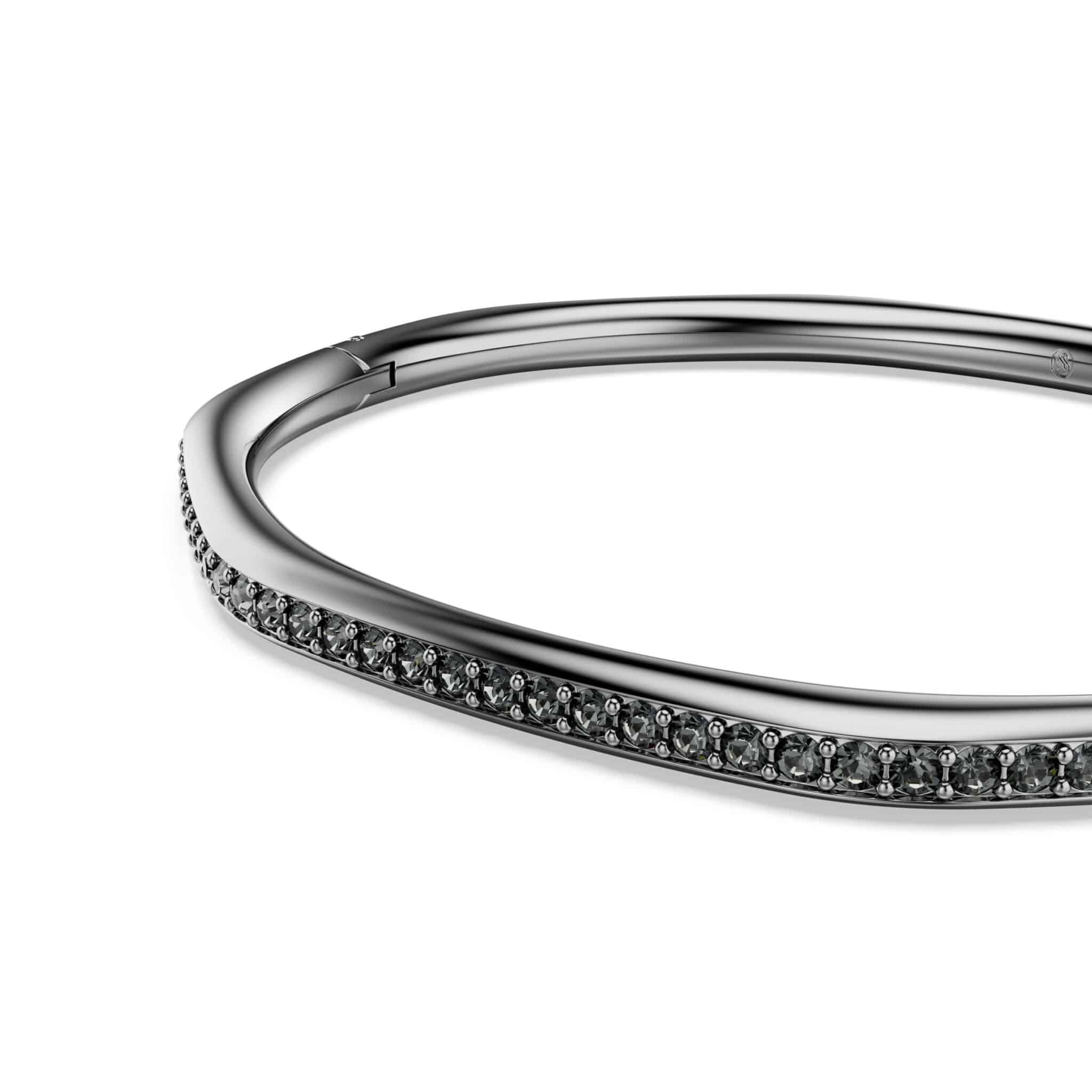 Swarovski Dextera Bangle featuring clear crystal accents and a sleek silver-tone design, stylish jewelry accessory.