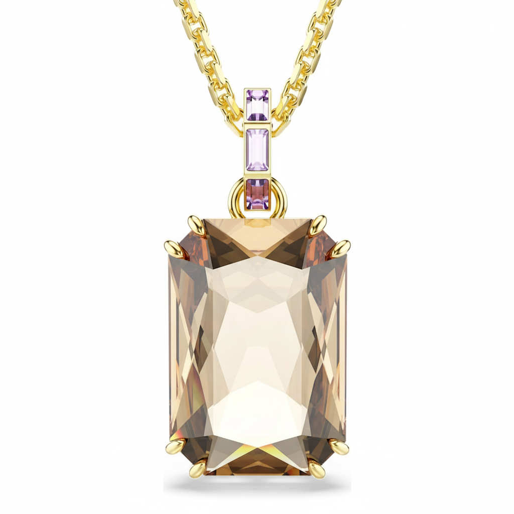 Swarovski Millenia pendant with octagon cut caramel crystal, gold-tone plated, elegant jewelry accessory.