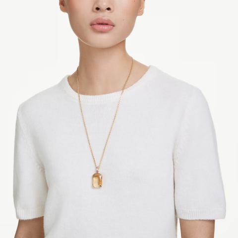 Swarovski Millenia Pendant with octagon cut caramel crystal, gold-tone plated jewelry piece featuring a sleek, elegant design