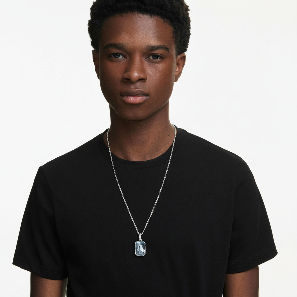 Swarovski Millenia pendant with octagon-shaped clear crystal, white color, rhodium-plated metal setting, elegant jewelry design
