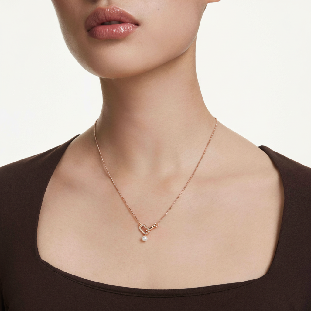 Swarovski Constella pendant with crystal pearl, round cut white crystal, rose gold-tone plated jewelry accessory