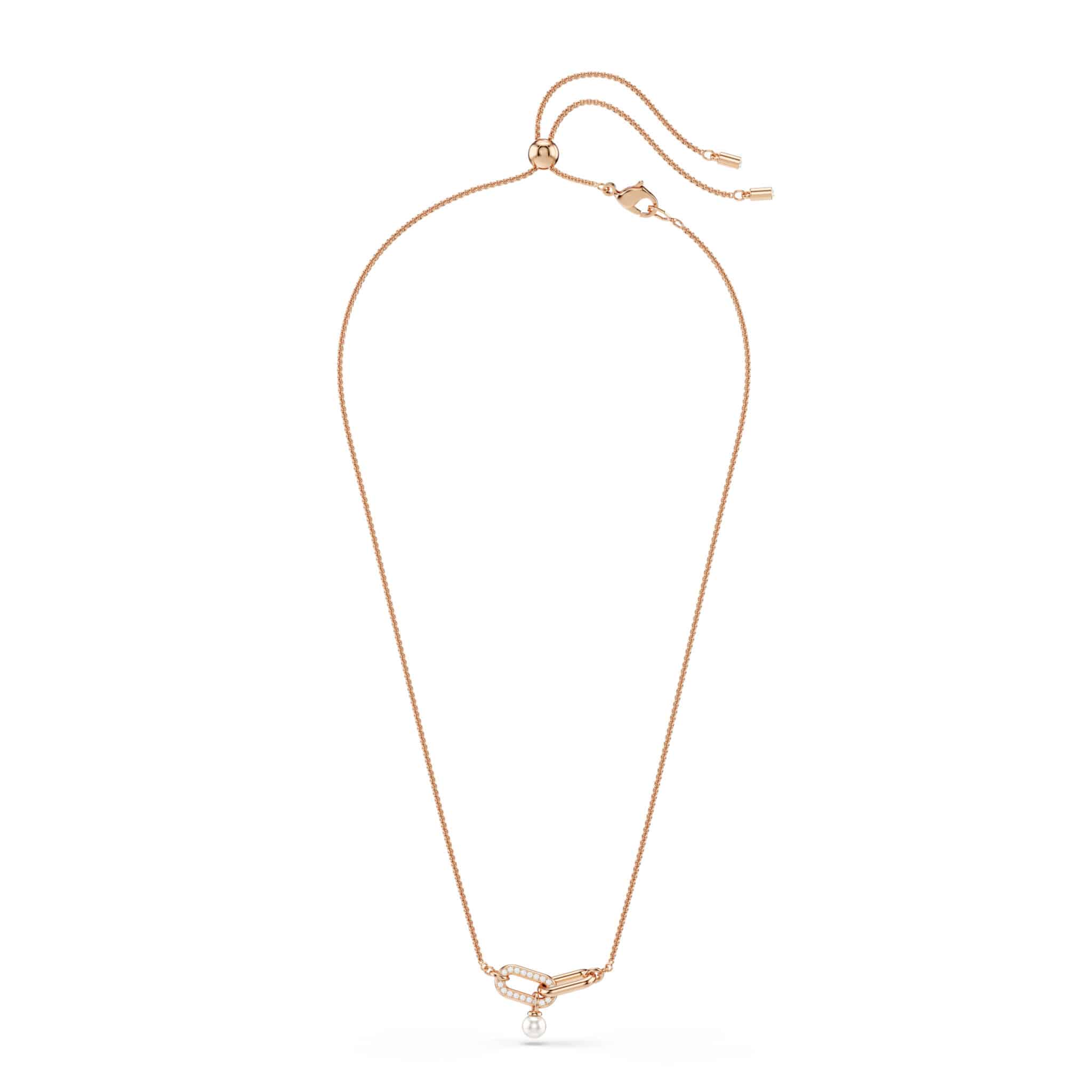 Swarovski Constella pendant with crystal pearl, round cut white crystal, rose gold-tone plated jewelry accessory.