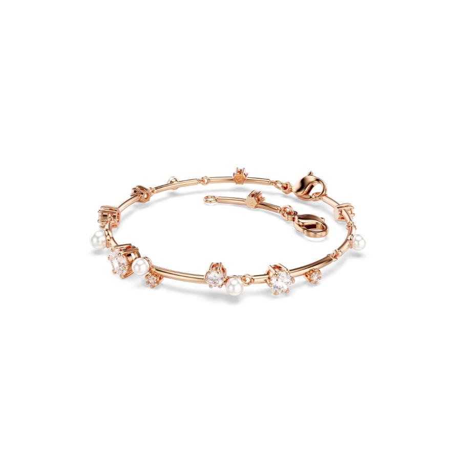Swarovski Constella tennis bracelet with crystal pearls and round cut crystals in rose gold plating, elegant jewelry accessory.