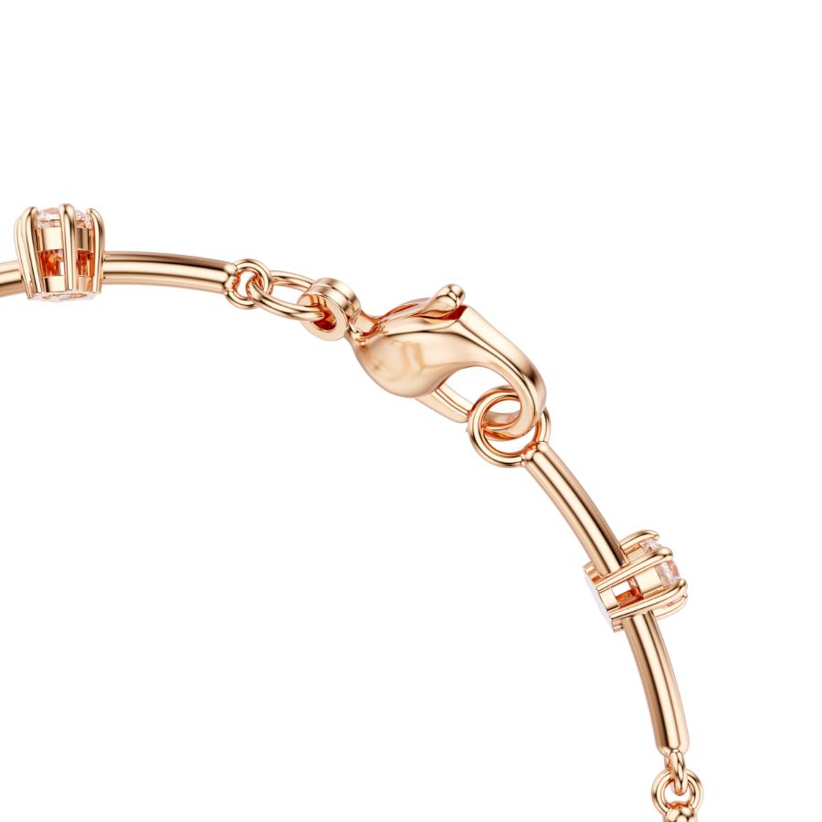 Swarovski Constella tennis bracelet with crystal pearls and round cuts in rose gold plating, elegant jewelry accessory.