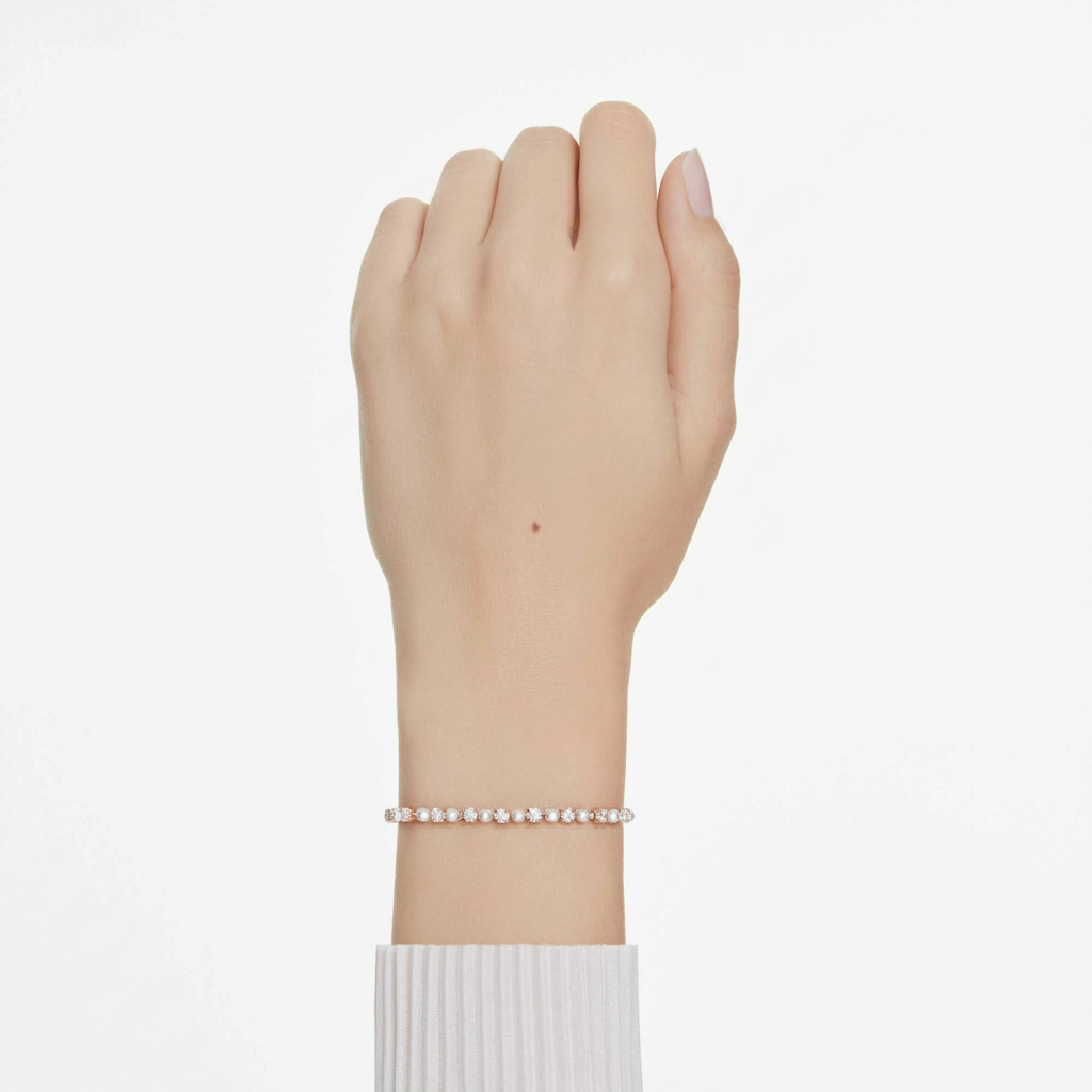 Swarovski Matrix tennis bracelet with white crystal pearls and round cuts, rose gold-tone plated, elegant jewelry accessory.