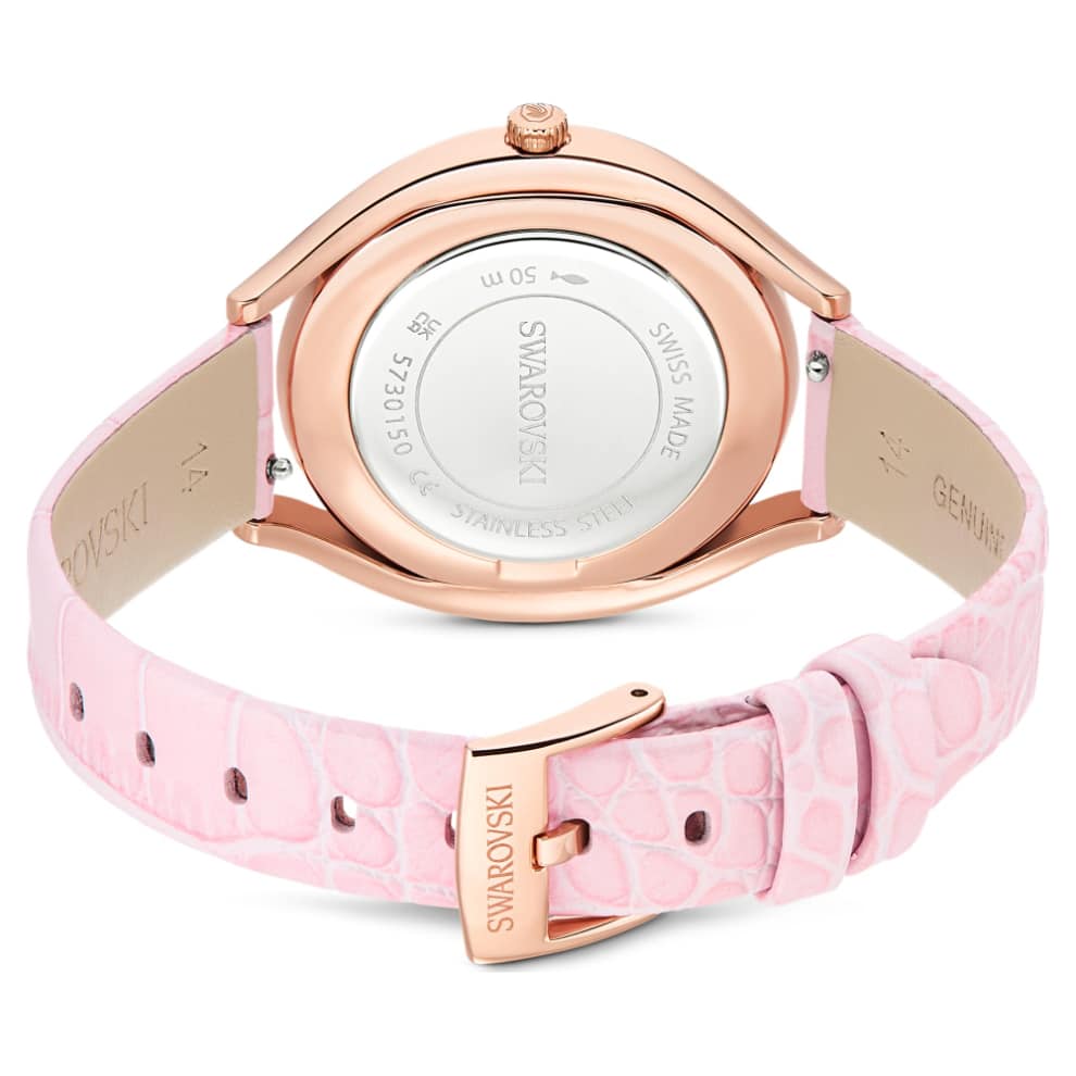 Swarovski Crystalline Aura Swiss-made watch with pink leather strap and rose gold-tone finish, featuring sparkling crystal details.
