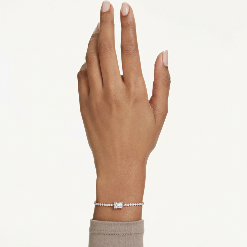 Swarovski Matrix Tennis Bracelet with sparkling crystal stones and silver-tone chain on a white background