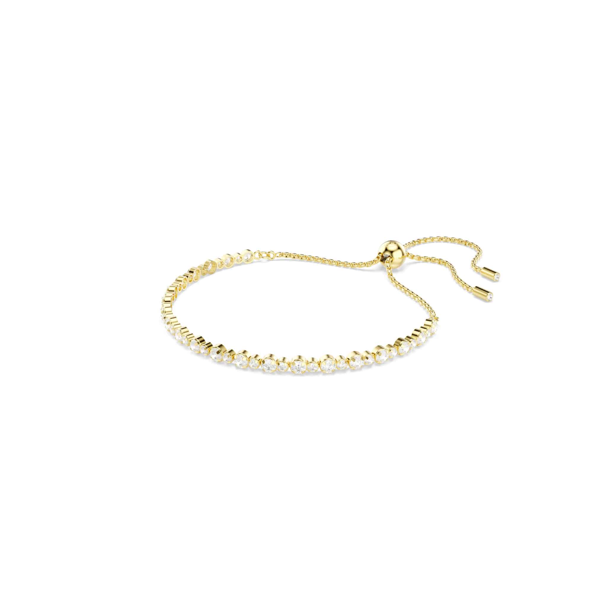 Swarovski Matrix tennis bracelet with sparkling clear crystals and stainless steel chain on a white background.