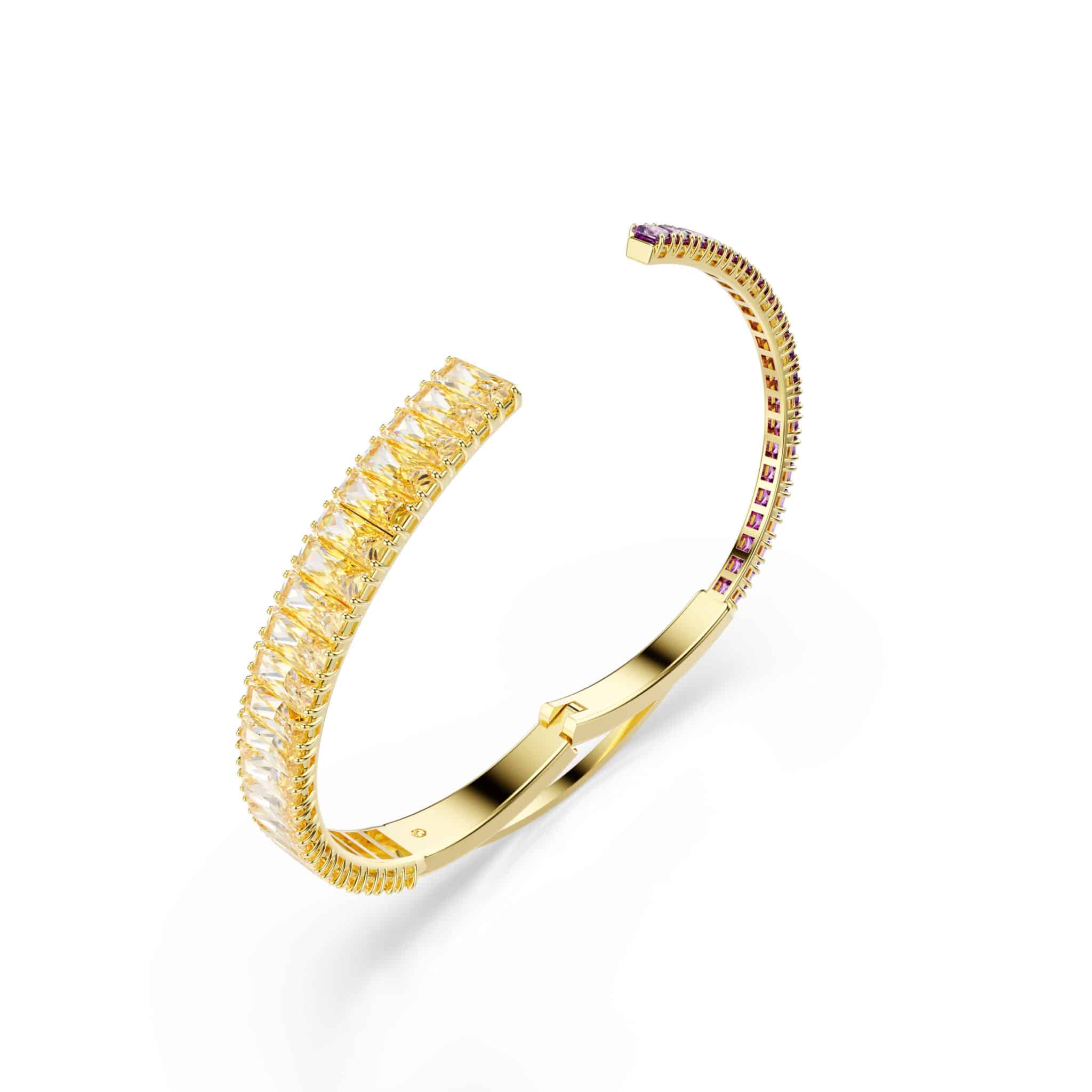 Swarovski Matrix Bangle featuring sparkling crystal accents and sleek silver-tone design, worn on a model's wrist.